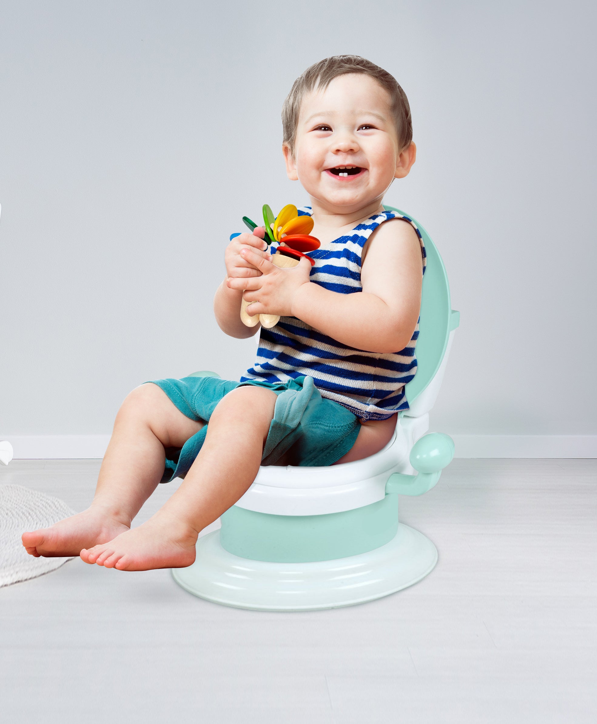 Mint Green Potty Chair with a comfortable seat, handles for support - Baby Moo