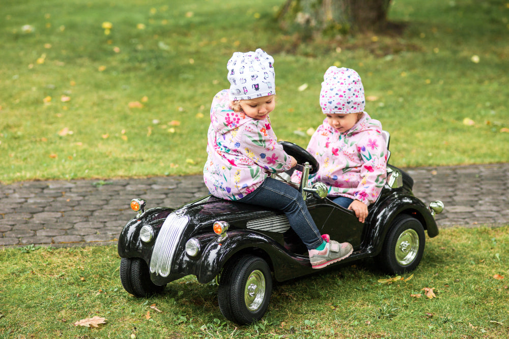 The Benefits of Ride-On Cars and Bikes for Kids' Development