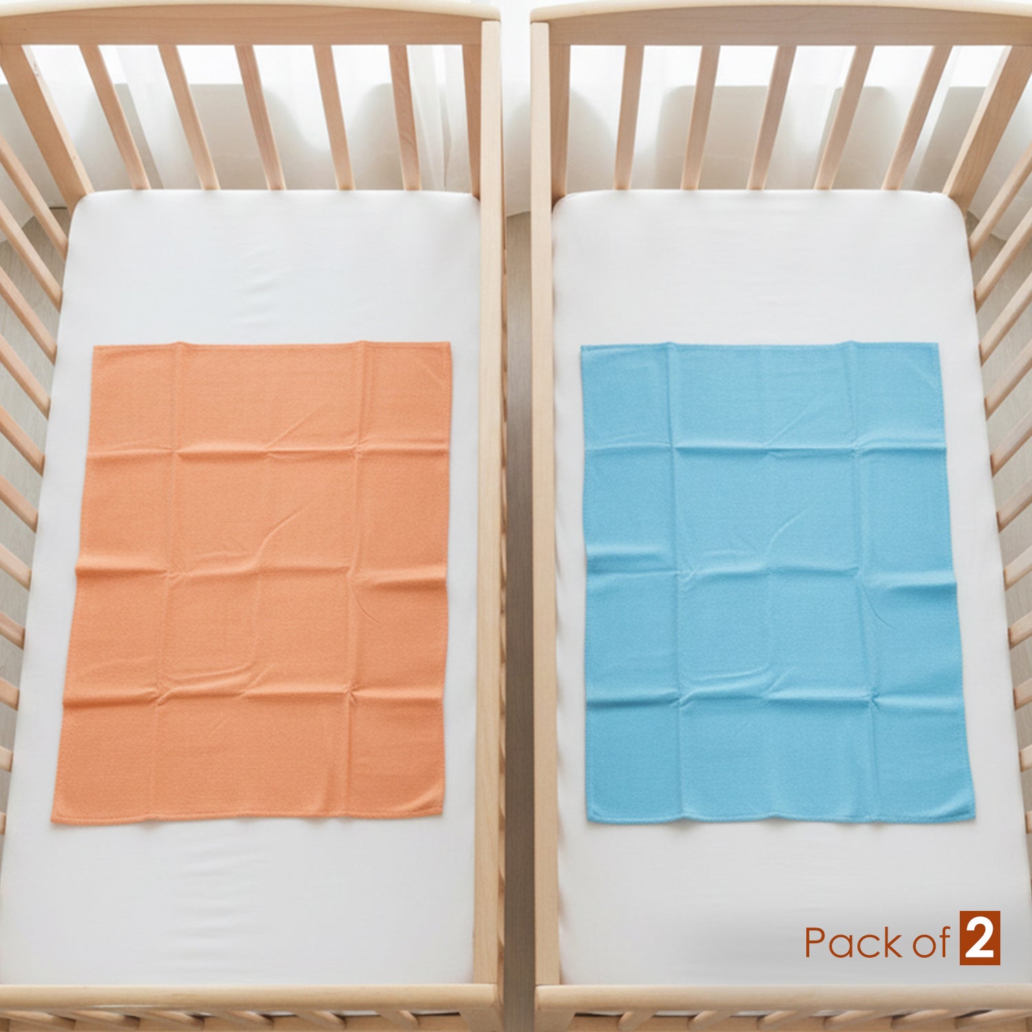 Baby Moo Plain Changeable Dry Sheet Water-resistant Bed Protector Pack Of 2 - Orange, Blue