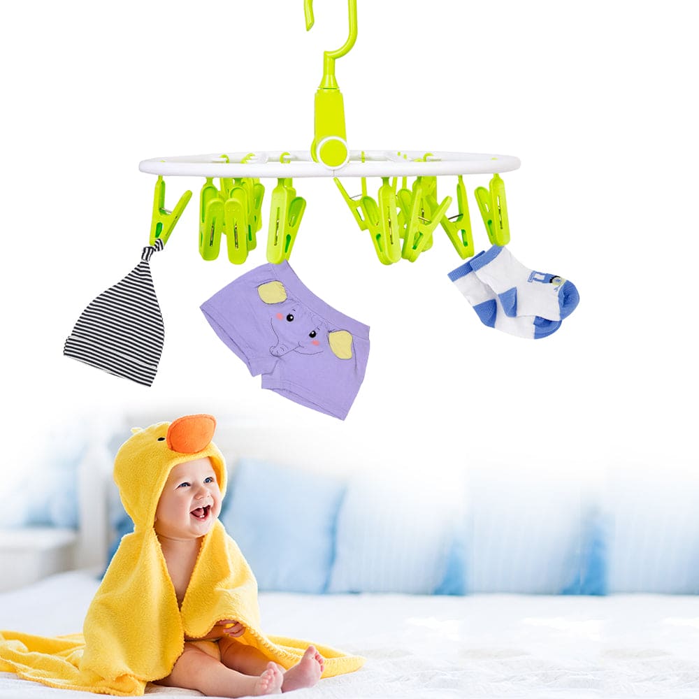 https://babymoo.in/cdn/shop/products/ClothesHangerRoundFoldable18ClipsGreen.jpg?v=1651489798